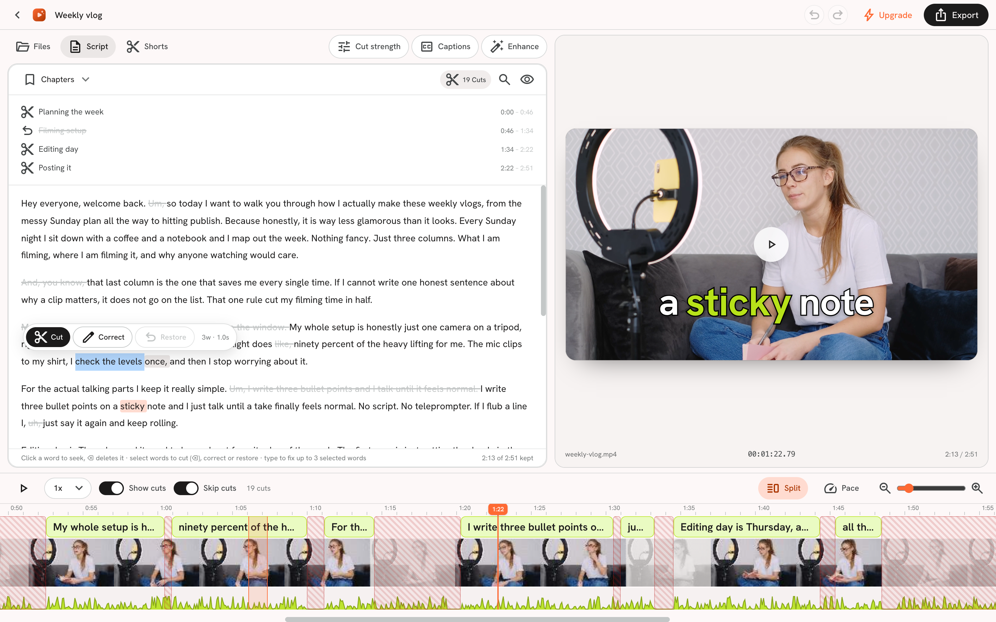 Three words selected in the transcript with the Cut, Correct and Restore popover open